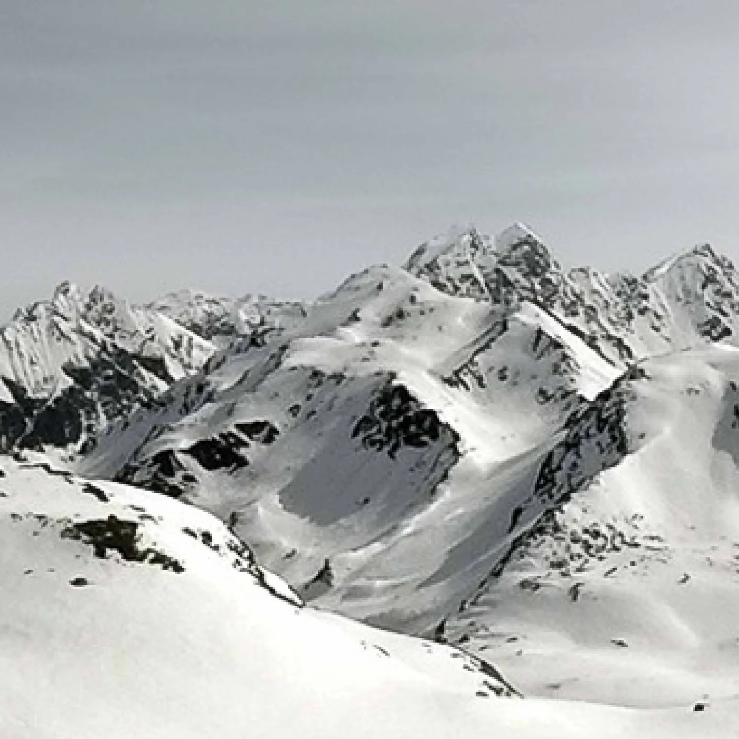 Image of the Swiss mountains covered in snow.