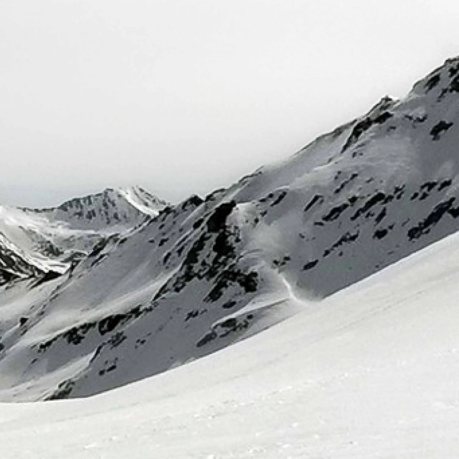 Image of the Swiss mountains covered in snow.