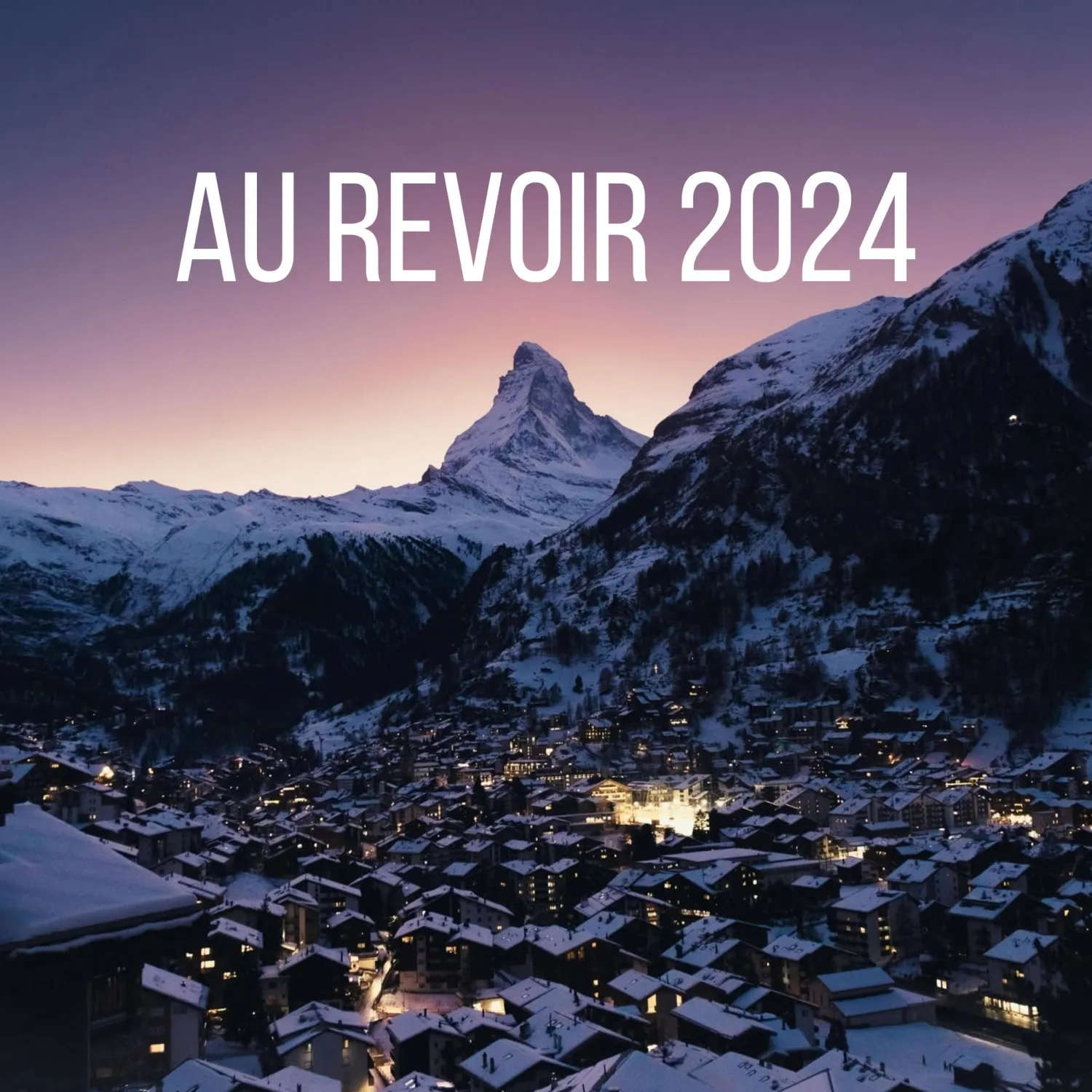 An image of the town of Lausanne at dusk with an Au Revoir 2024 caption.