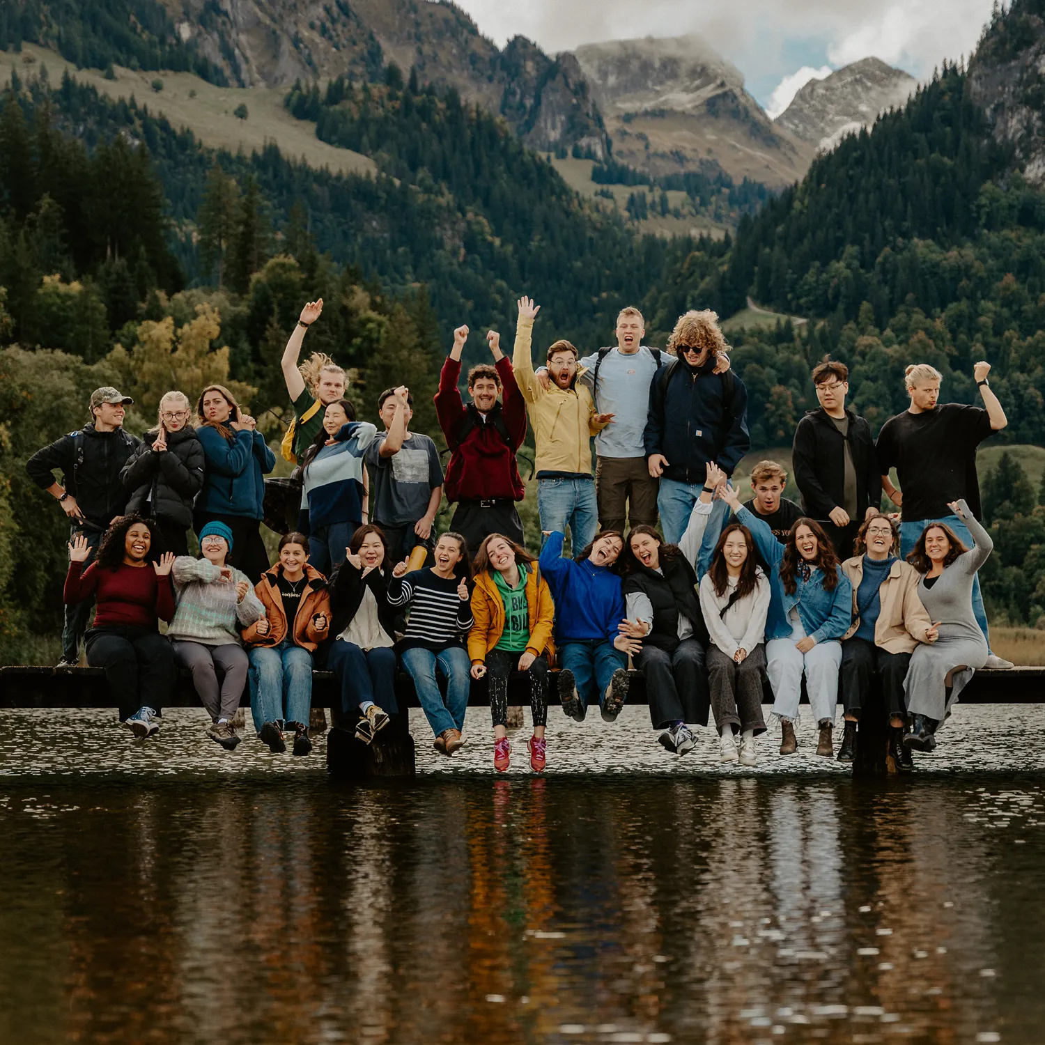 YWAM students standing in a Switzerland outdoors happy and full of joy.