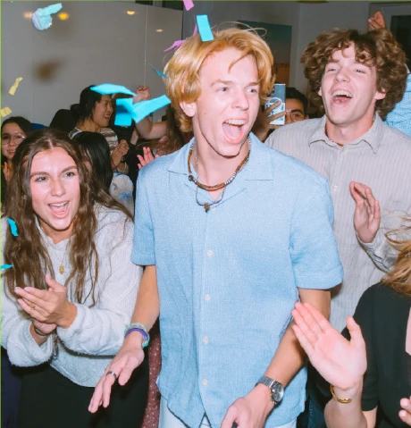 Young people celebrating together at summer camp